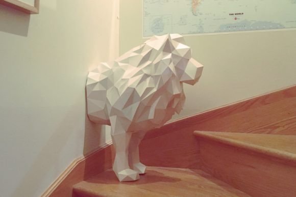 Lion Through the Wall Paper Sculpture: A Creative and Practical Home Decoration
